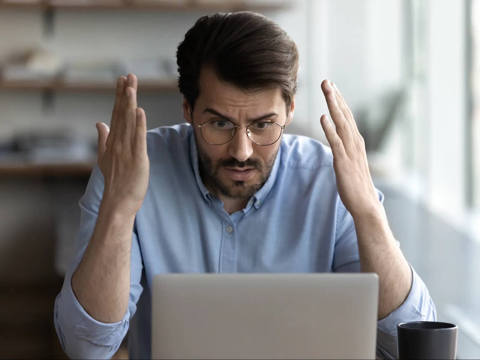a person with the hands up