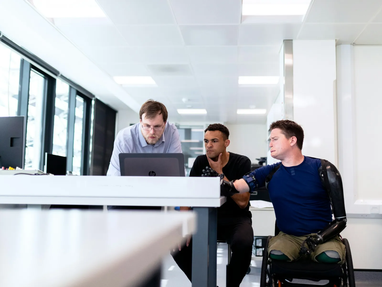 a group of men in an office