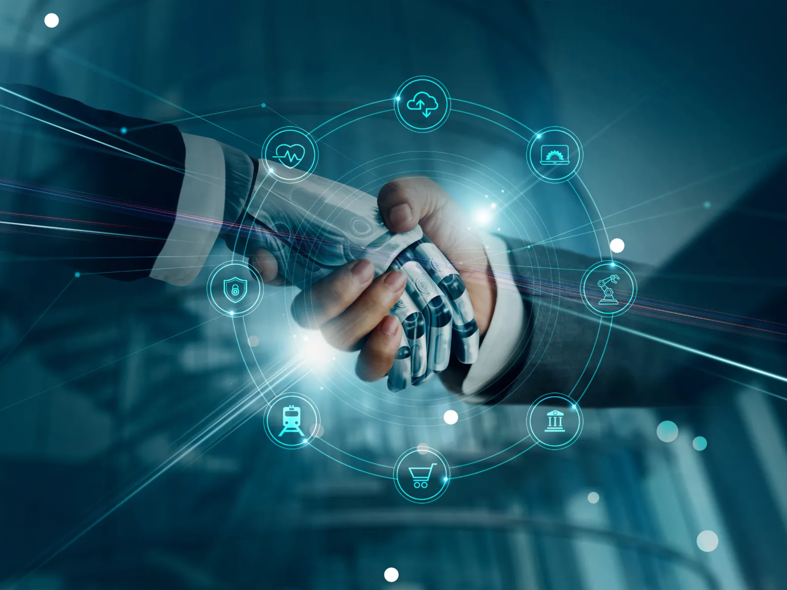 Human hand shaking robotic hand with digital technology and network icons surrounding them.