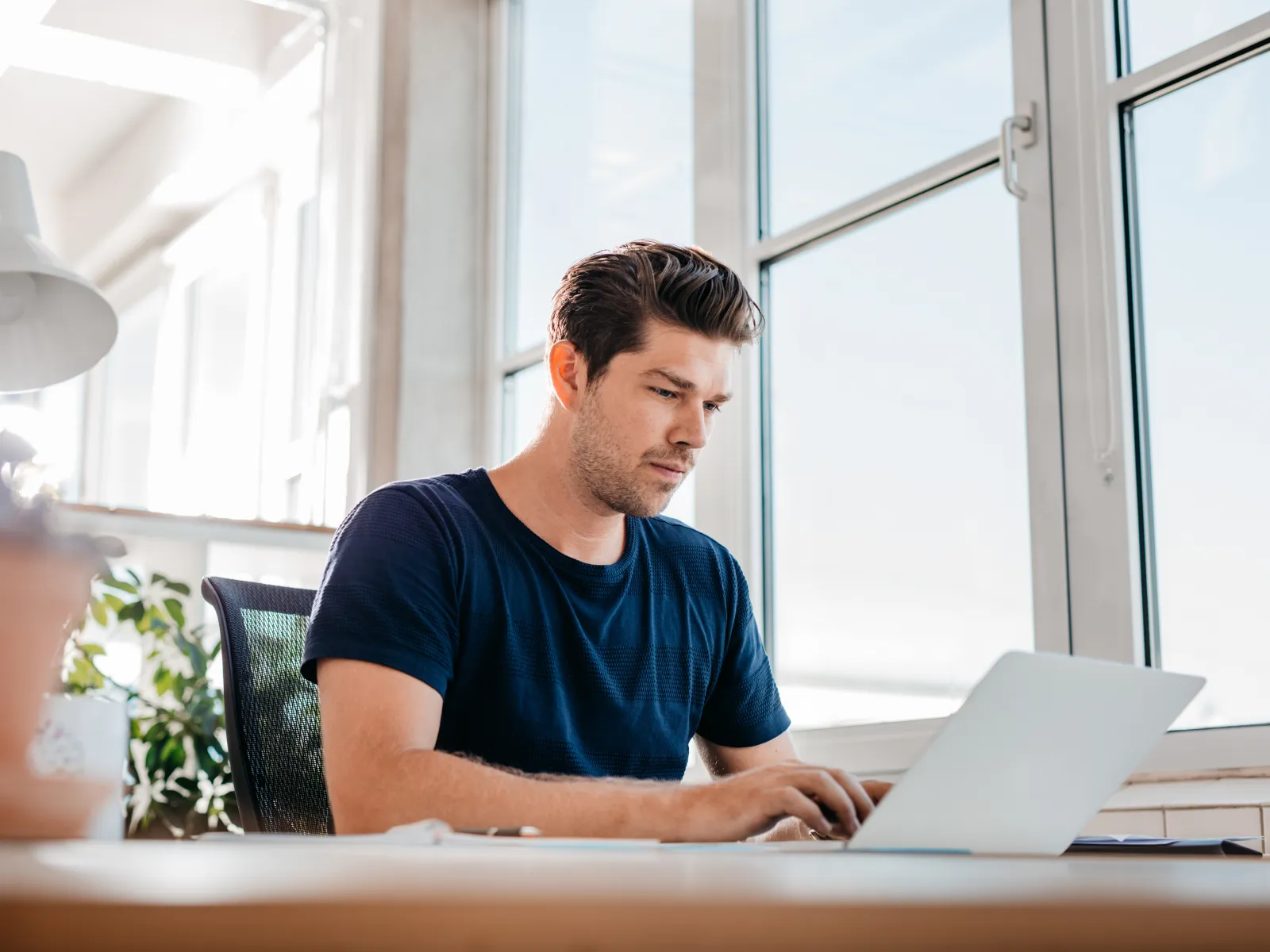 a man working on his laptop
