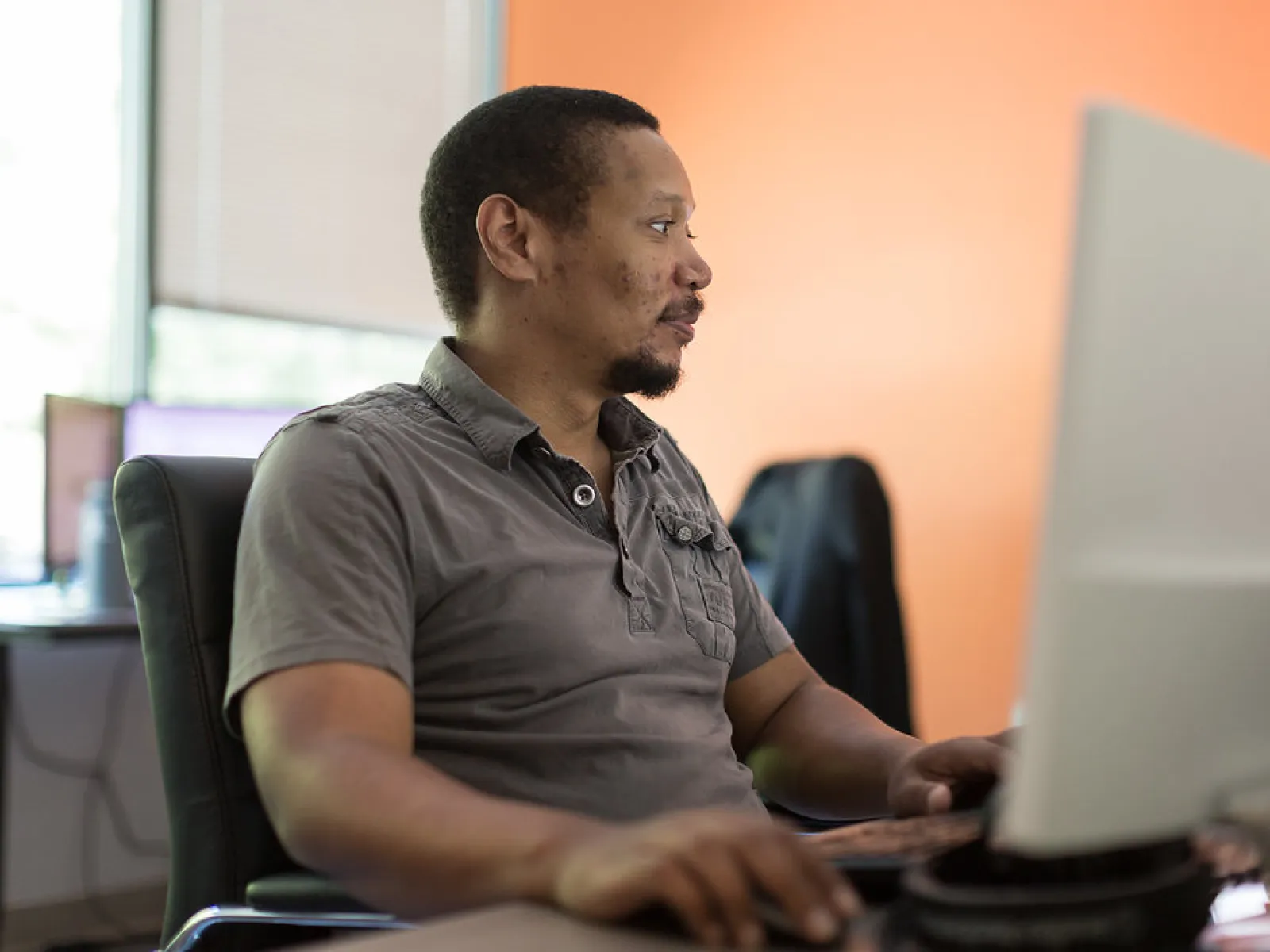 a man sitting at a desk