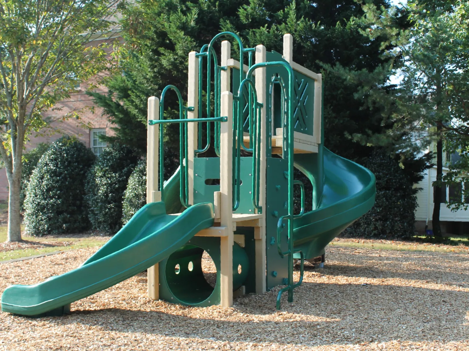 a green playground slide