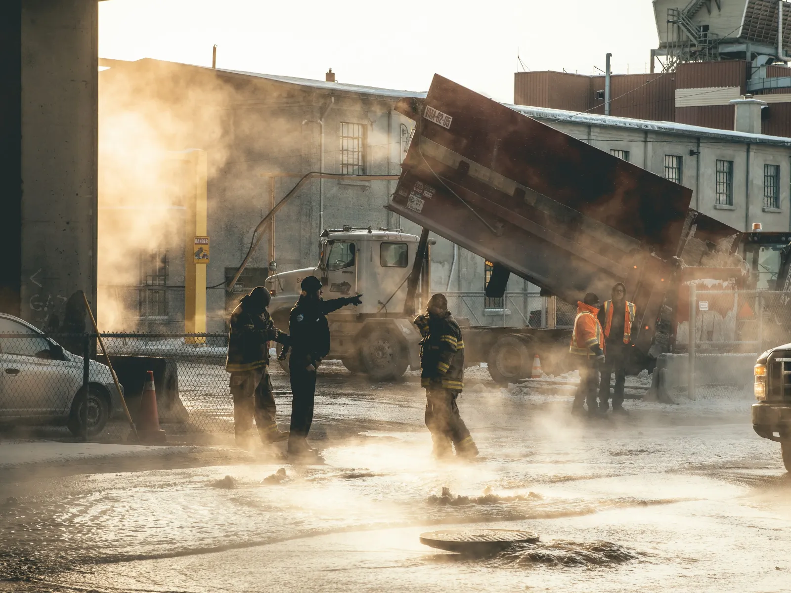 a group of people standing in a flooded area