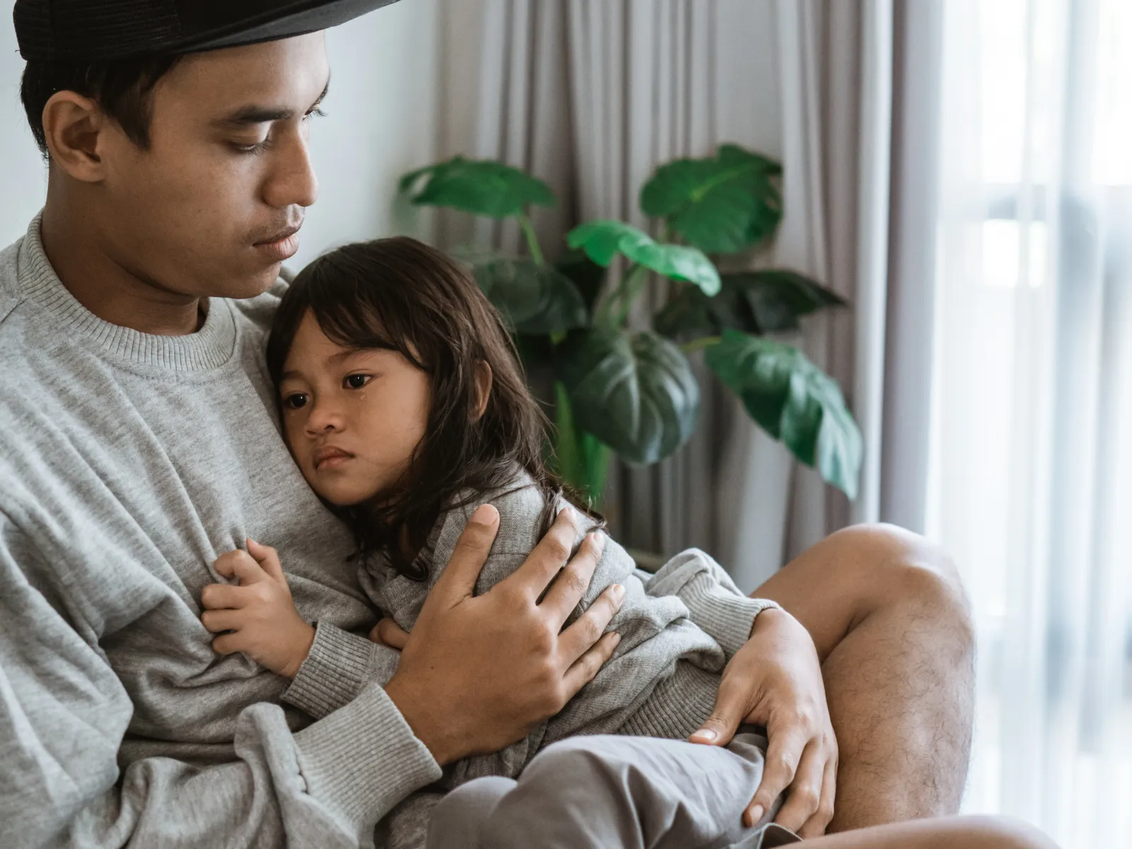 a person holding a baby