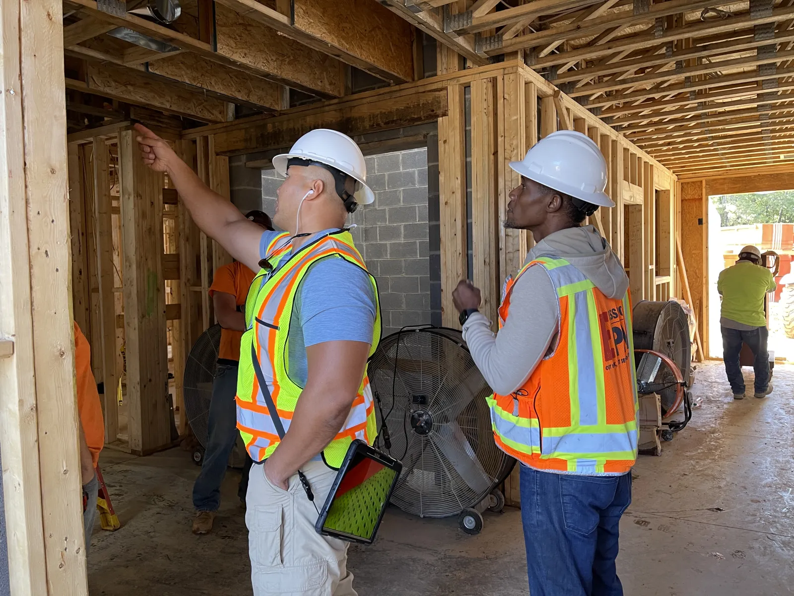 a few men wearing hardhats