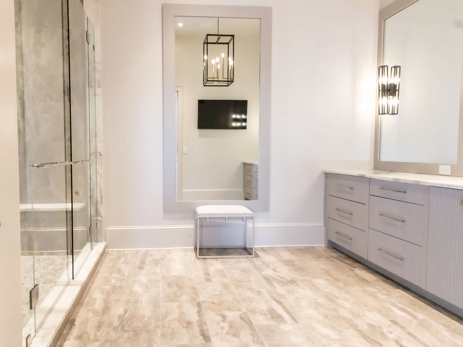a sleek beautifully designed neutral color bathroom by European Kitchen & Bathworks , Atlanta, GA.