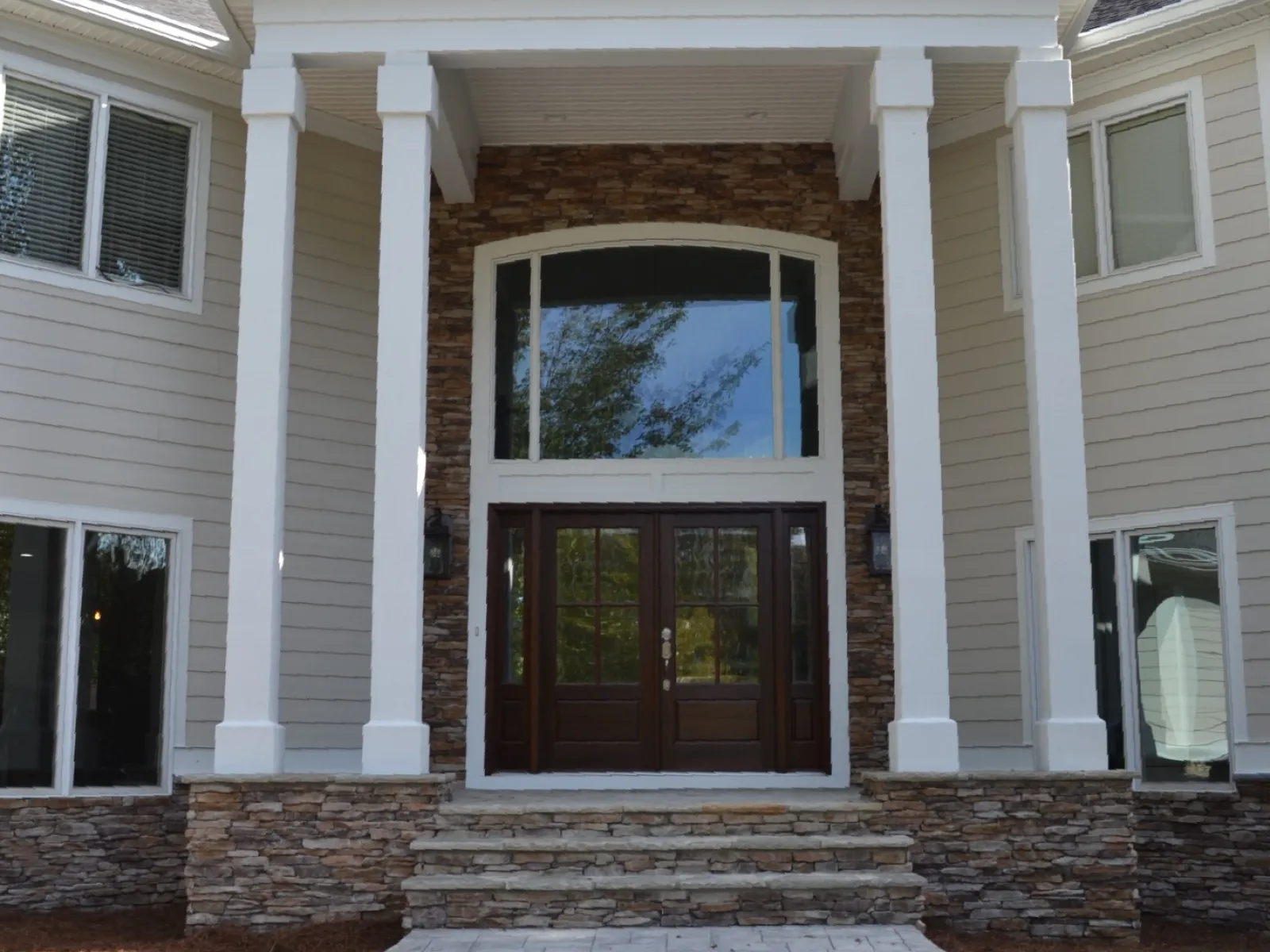 a white house with a large front door
