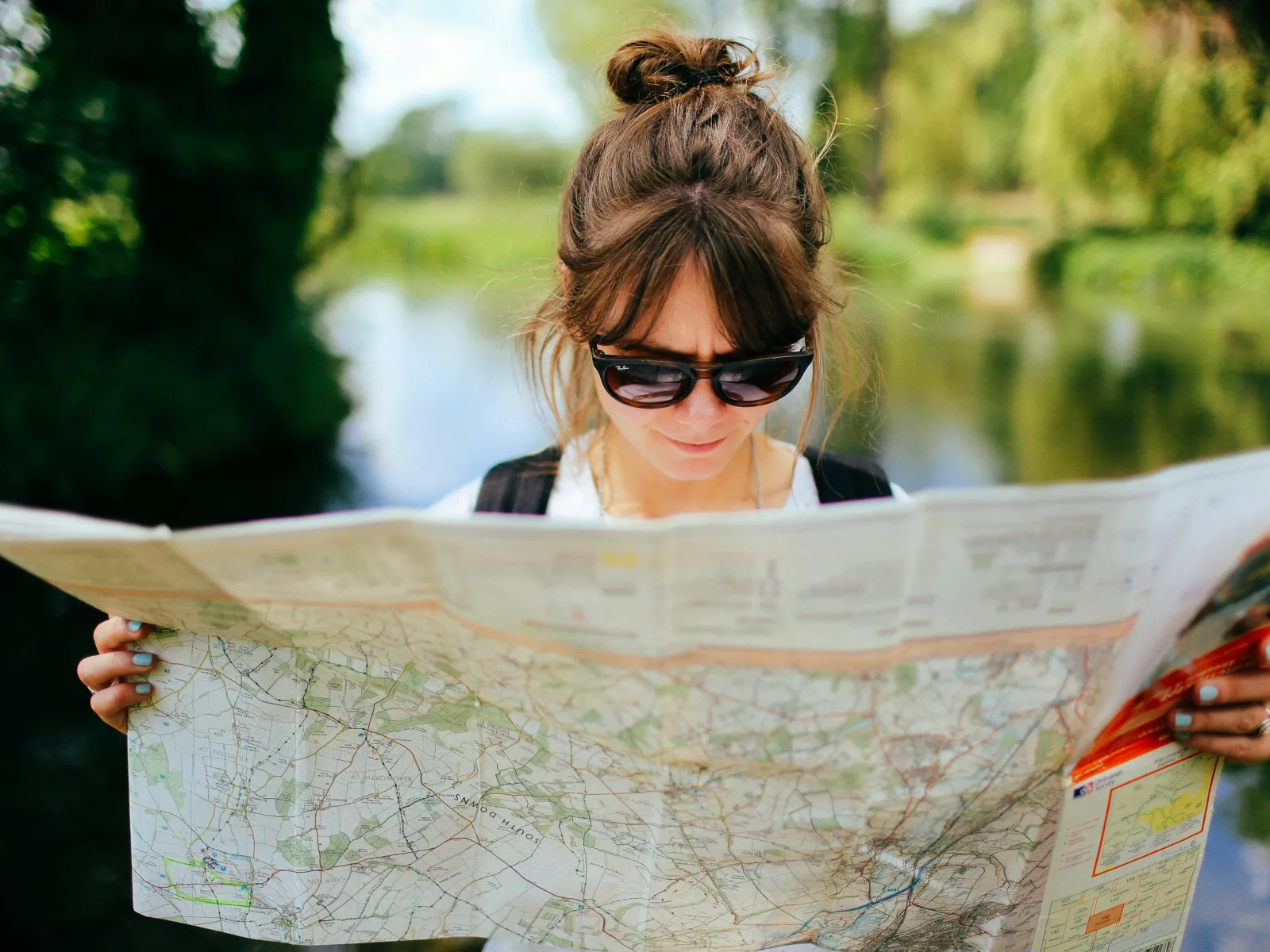 a person holding a map