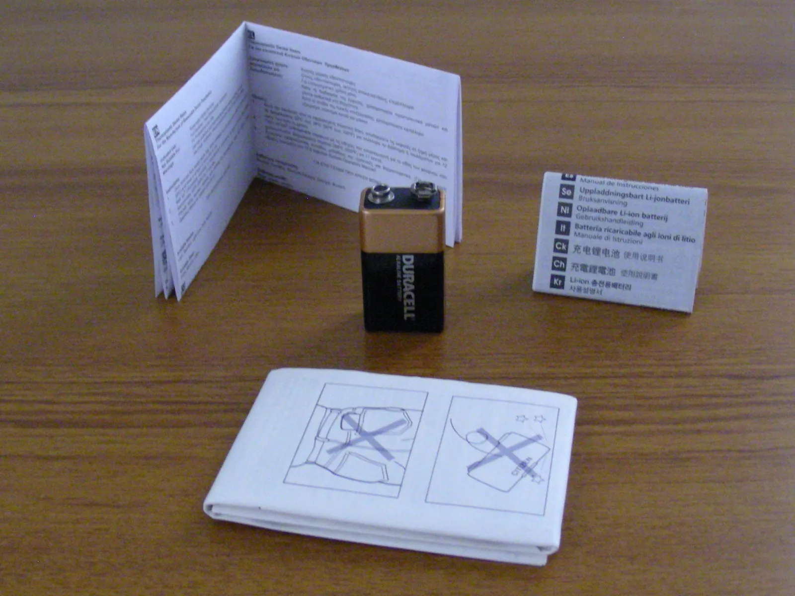 a group of papers and a lighter on a table