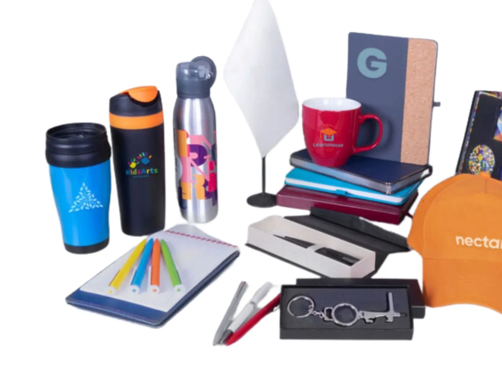 Assorted branded promotional products including tumblers, water bottles, notebooks, pens, a mug, and an orange nectar cap.