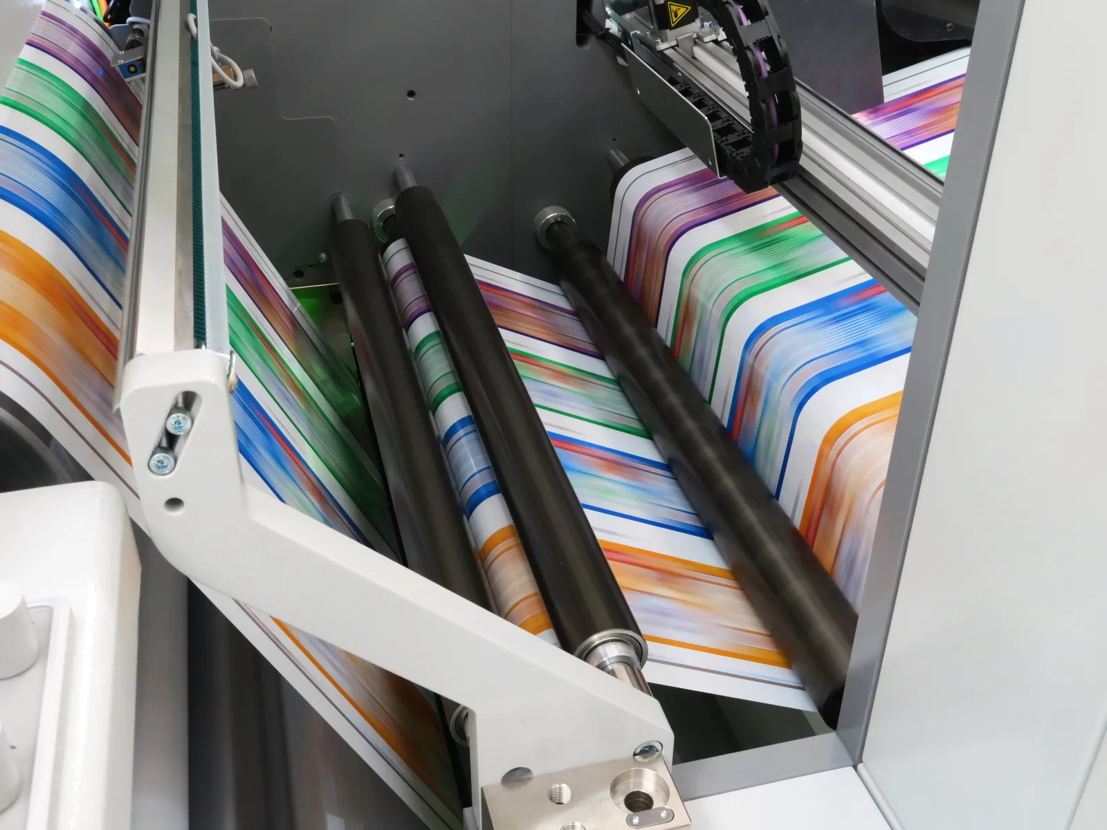 a rack of colorful ties