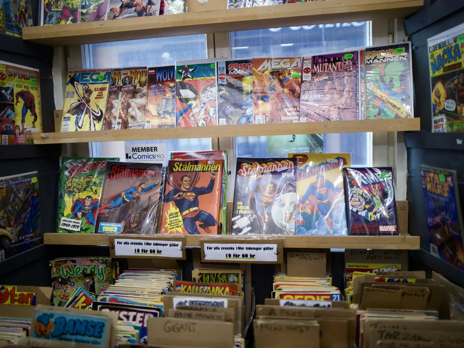a shelf of comic books