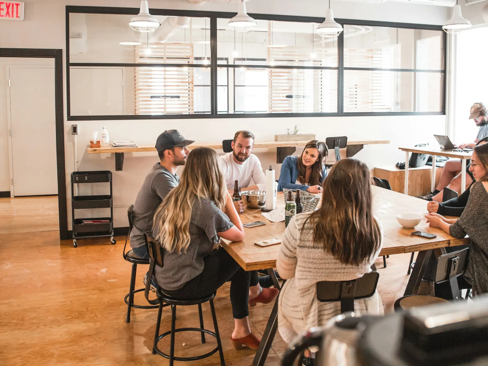 a group of people sitting at a table