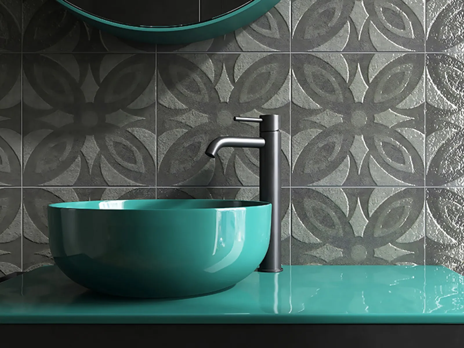 Modern teal bathroom sink with black faucet against patterned gray tile wall in stylish bathroom