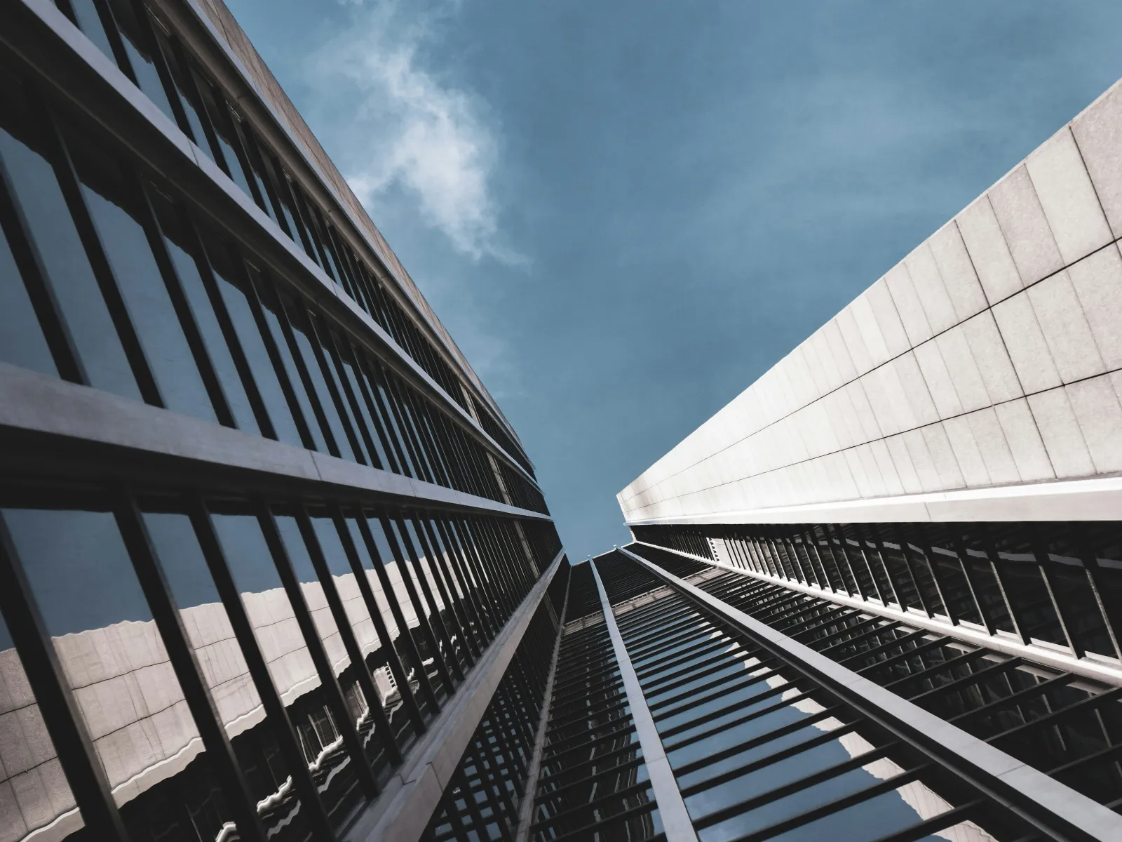 looking up at tall buildings