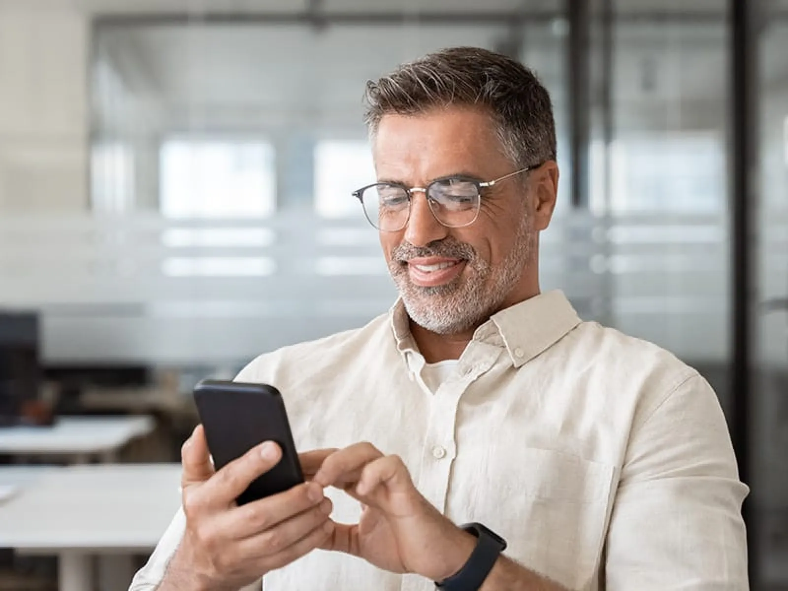 a man holding a phone