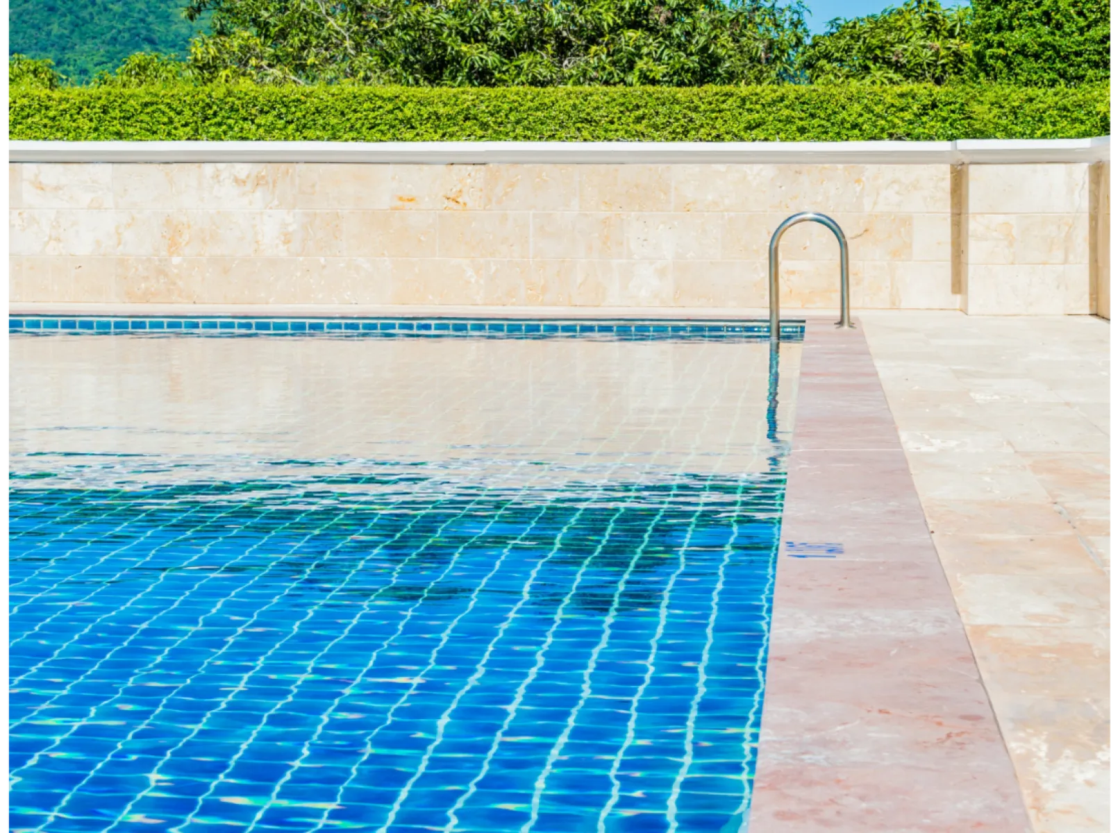 a swimming pool with a blue and white checkered floor