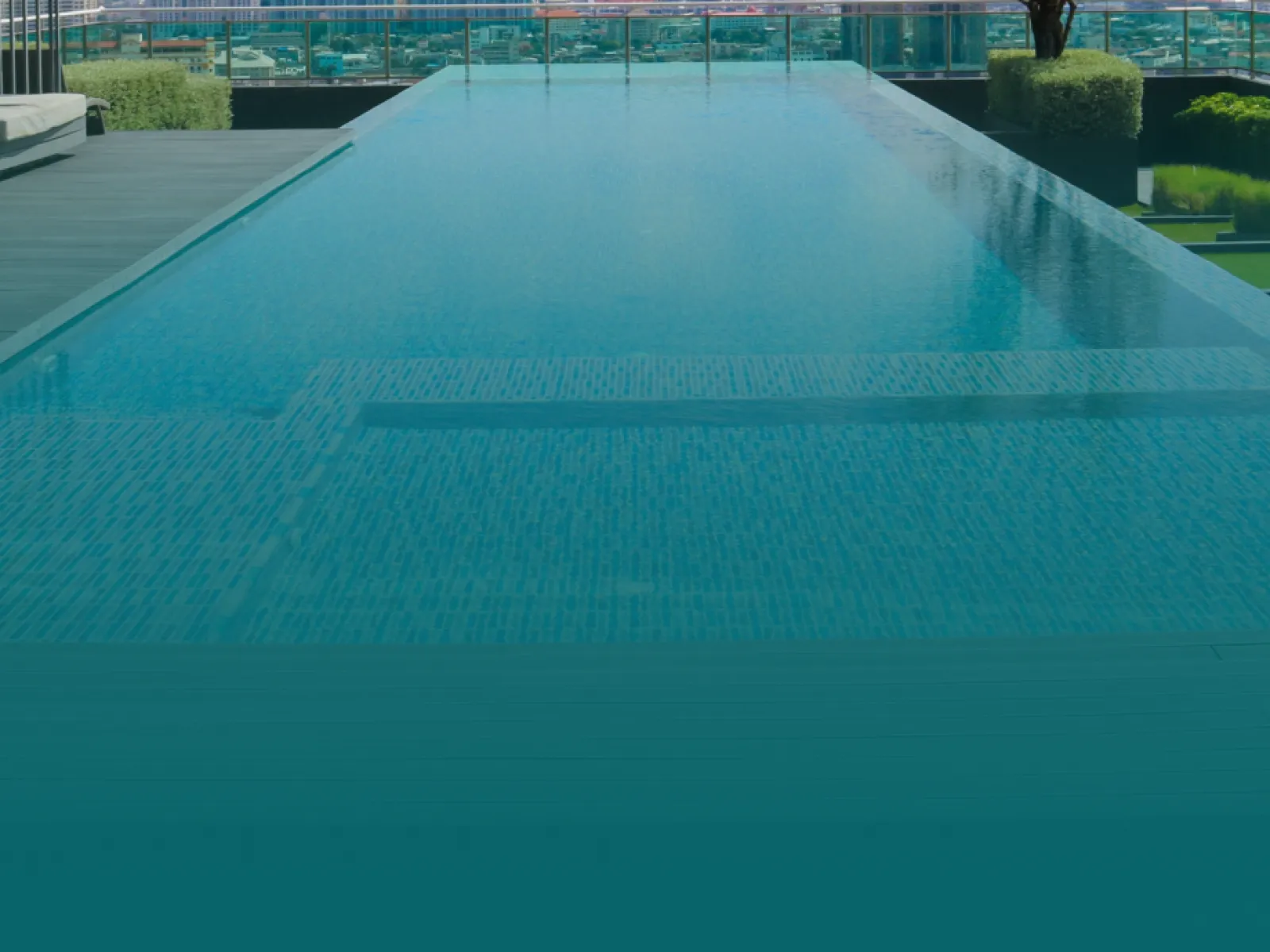 a large pool with a clear blue water