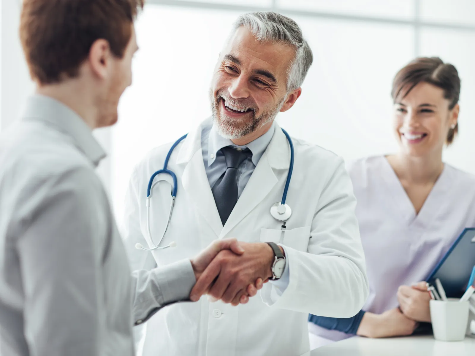 a doctor talking to a patient