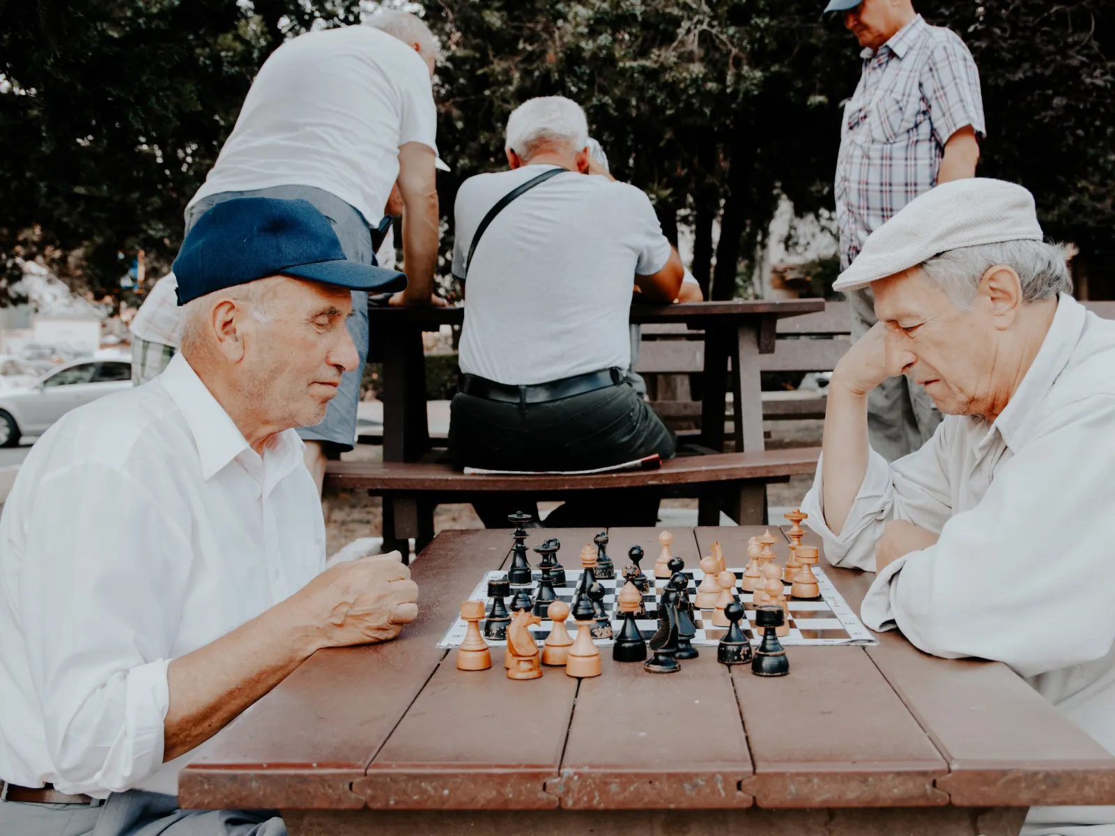 a group of men playing chess