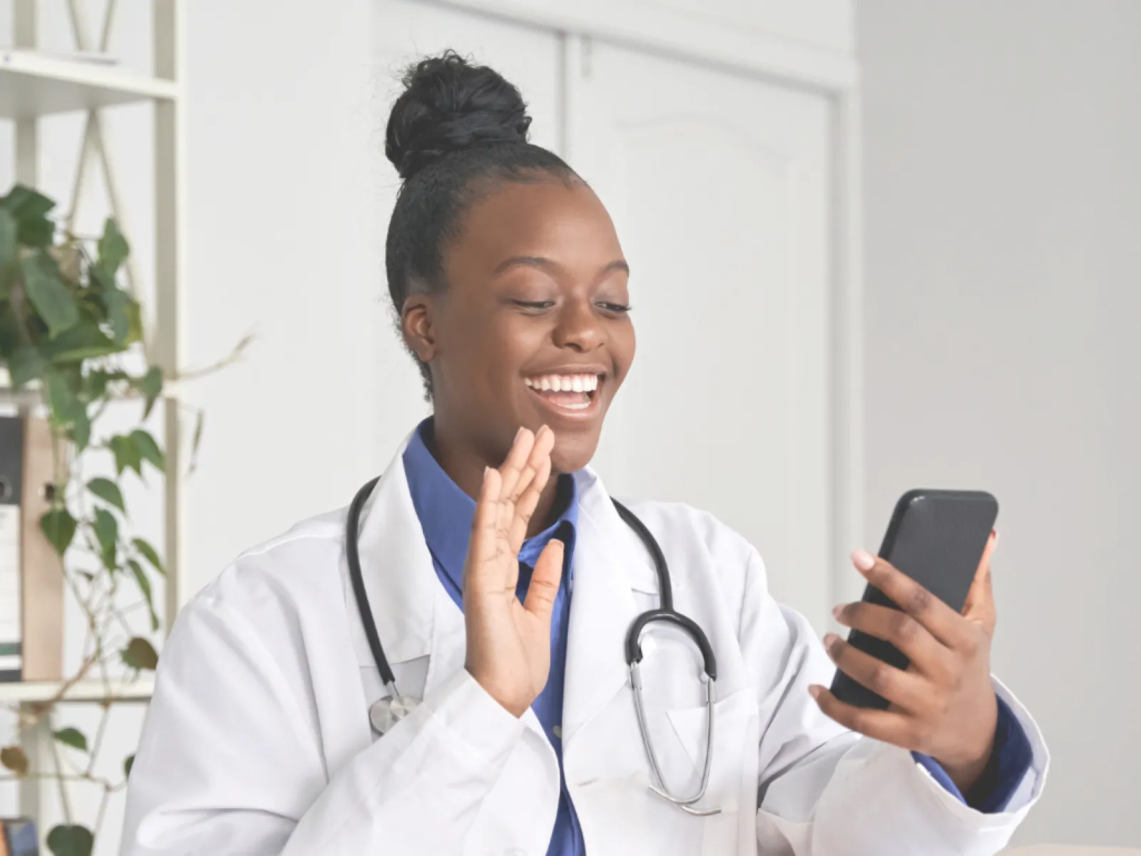 a doctor using a phone