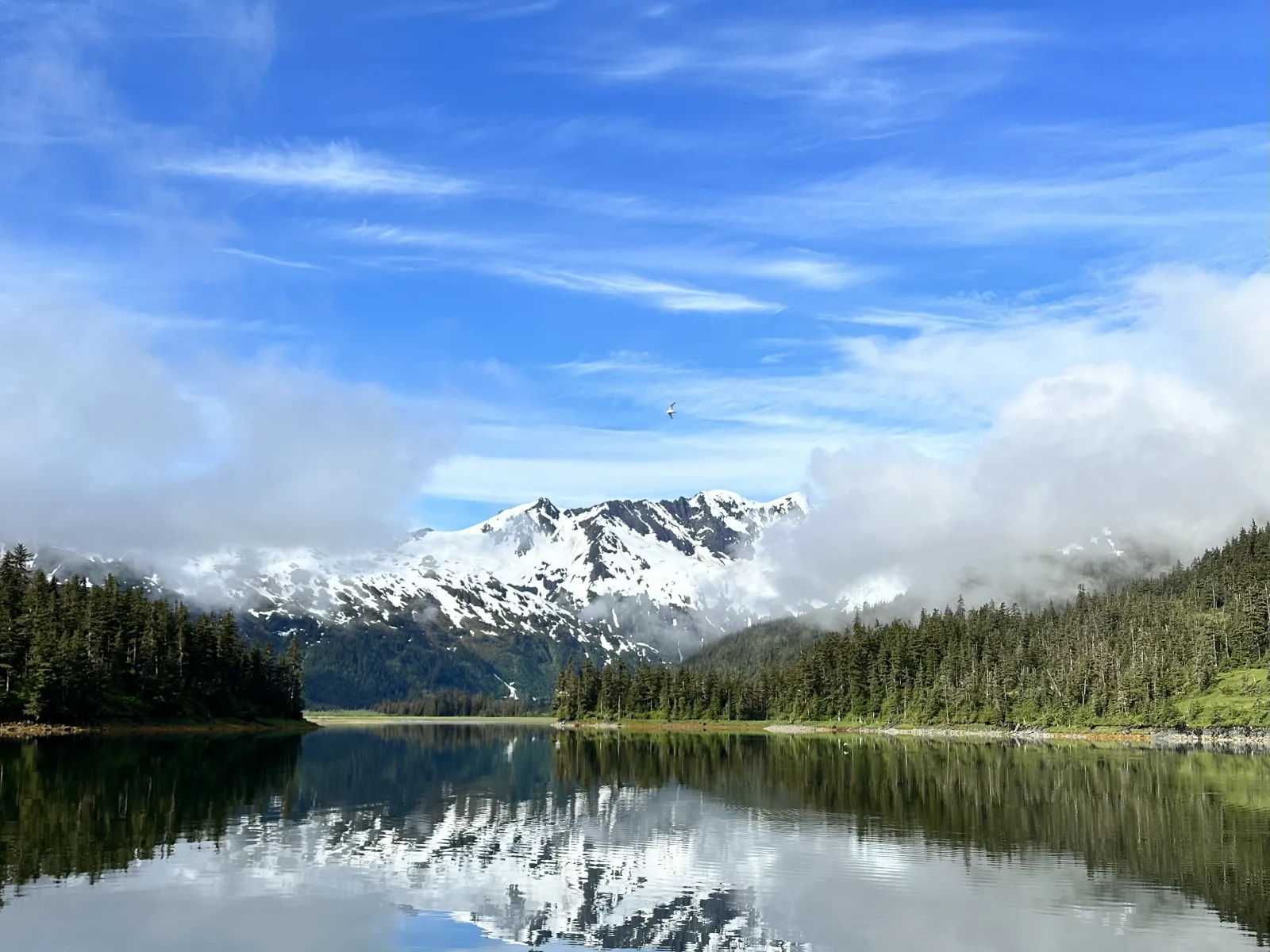 a lake with a mountain in the background