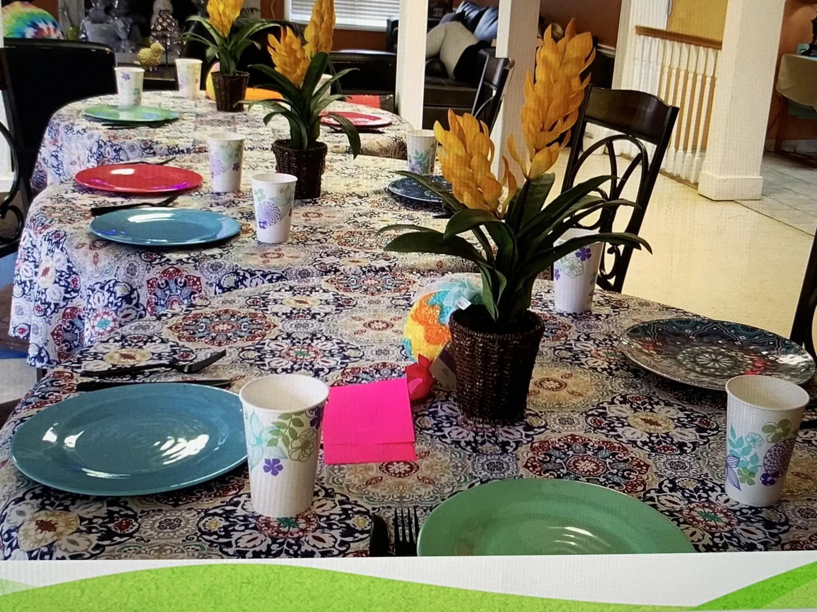 a table with plates and cups on it