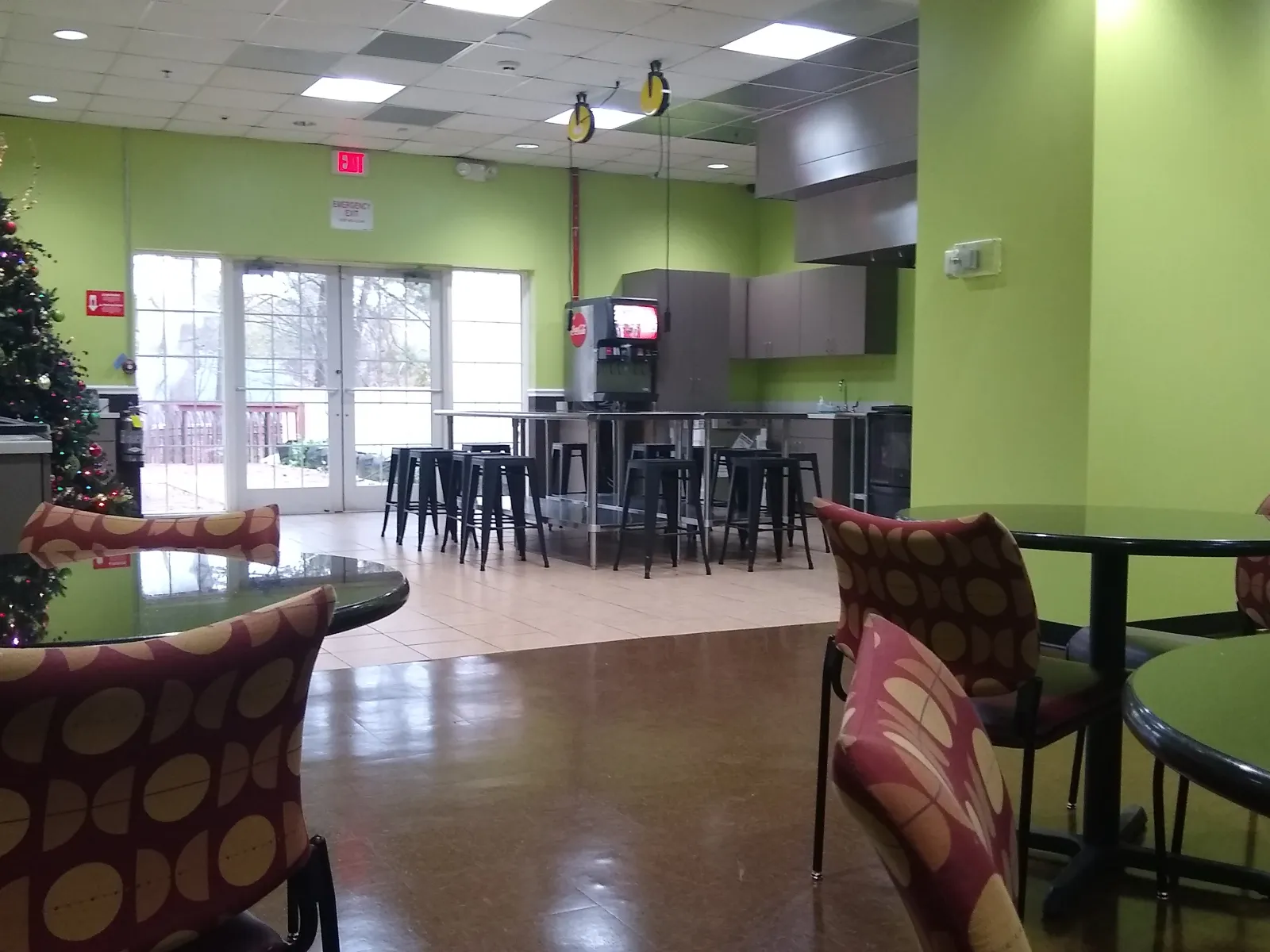 a room with chairs and tables