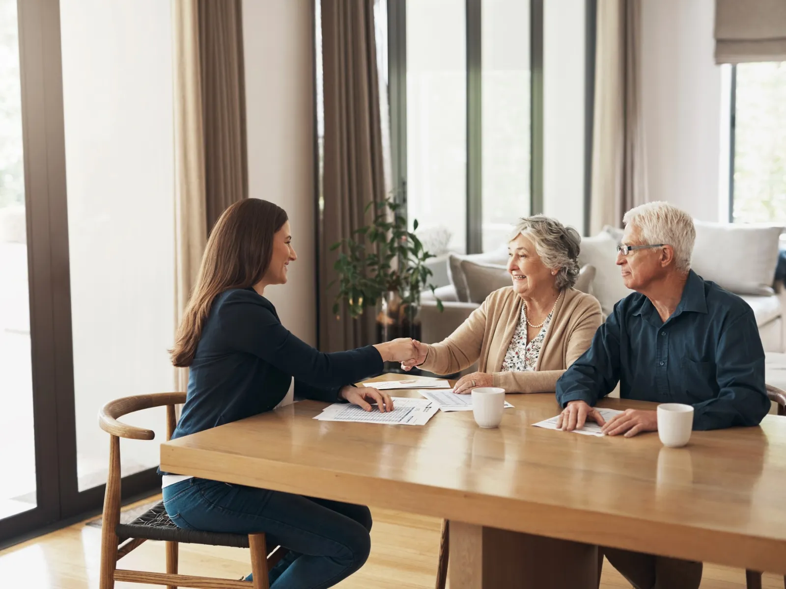a group of people sitting around a table