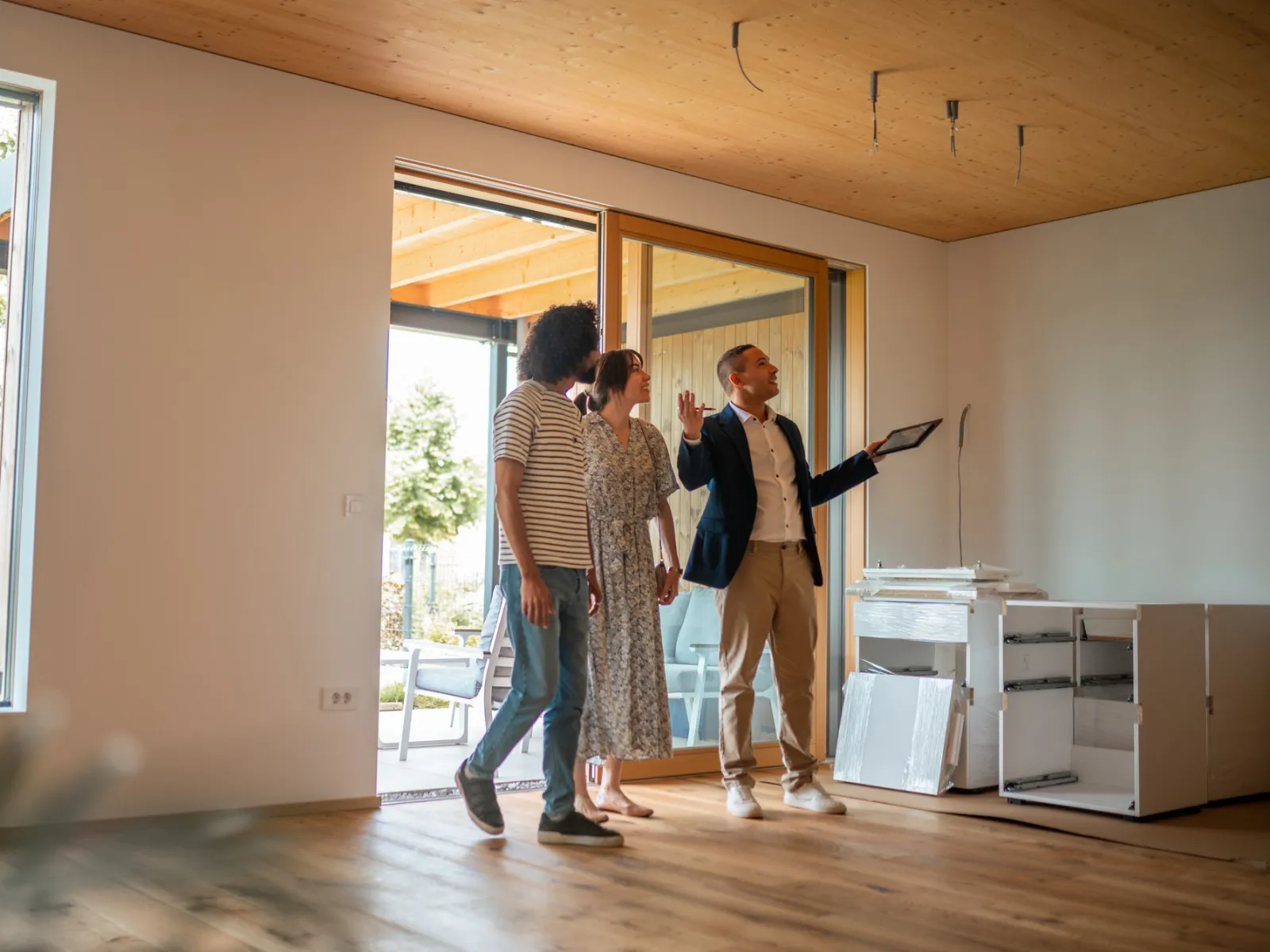 a group of people standing in a room