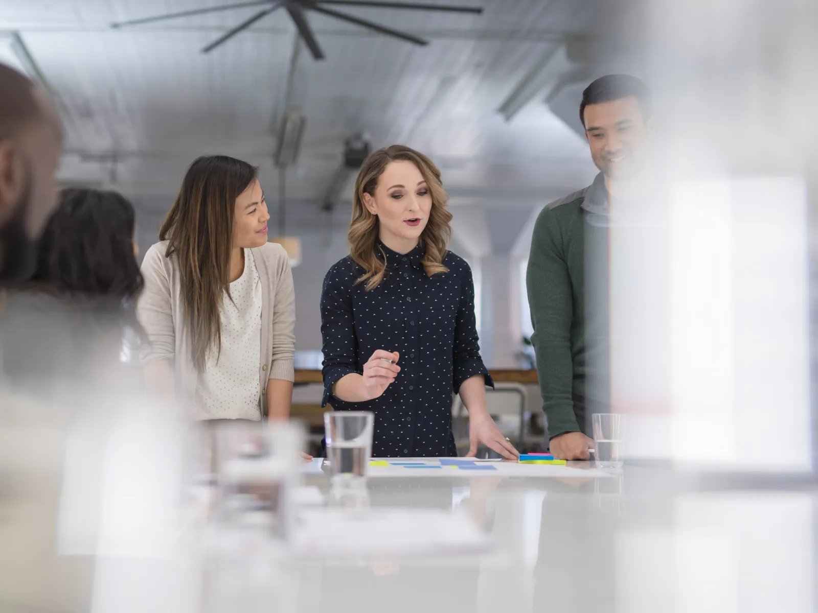 a group of people in a meeting