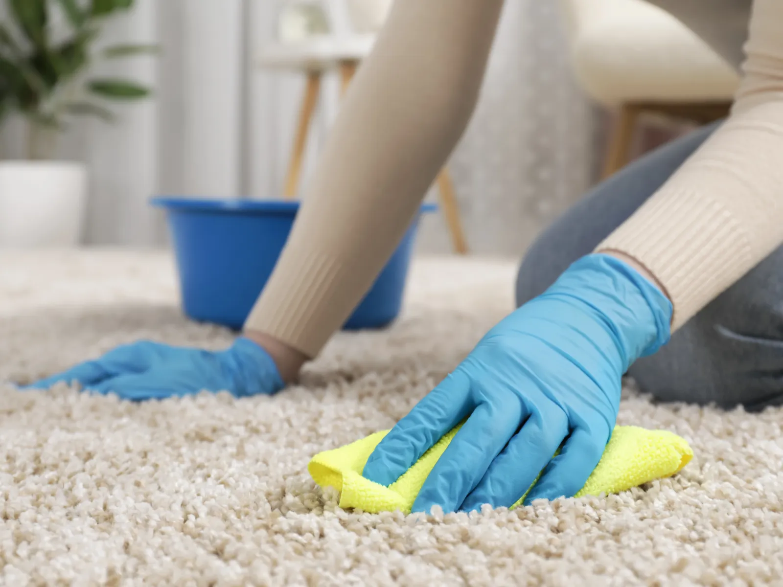 a person's feet with gloves on