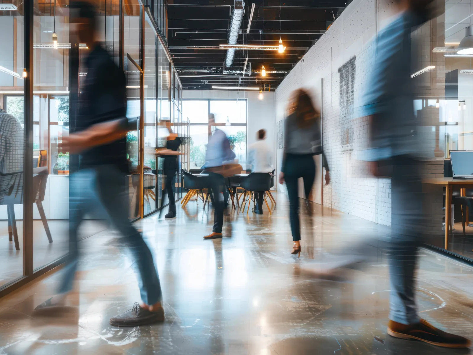 a group of people walking in a building