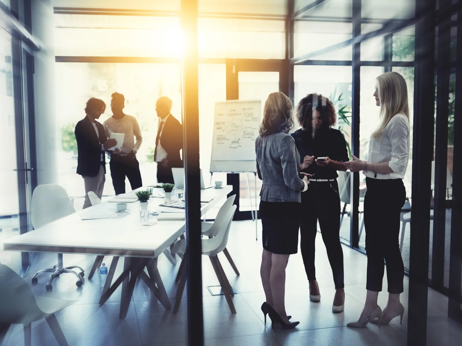 Business professionals in modern office having discussions and collaborating during a meeting session