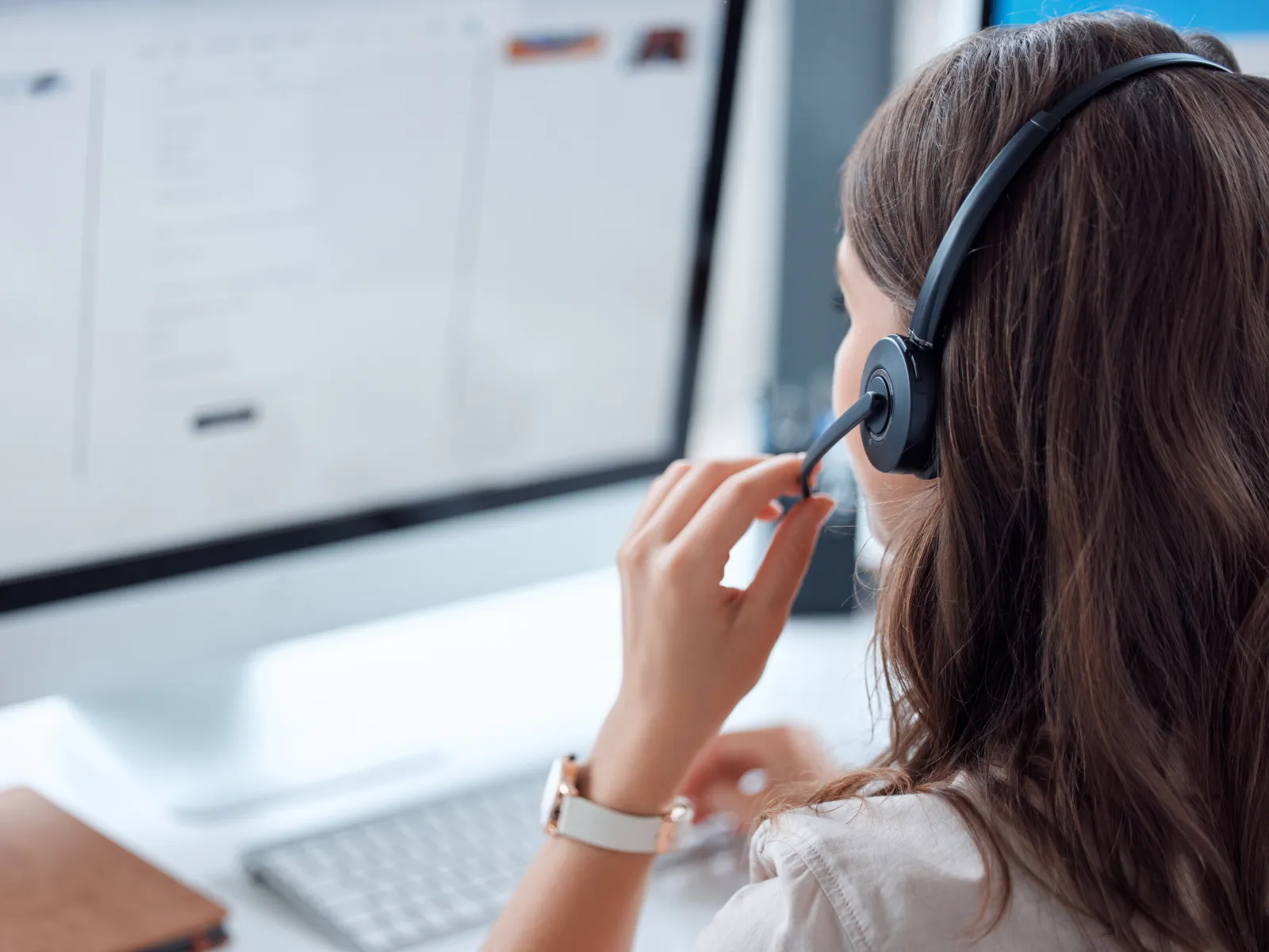 a woman using a headset