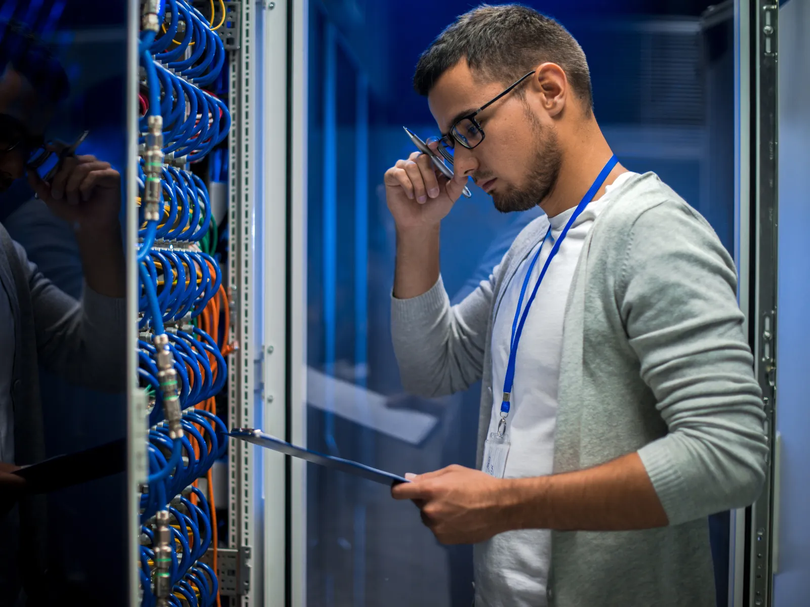 a man looking at a computer screen