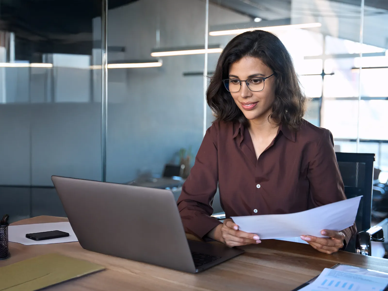 a woman sitting at a desk