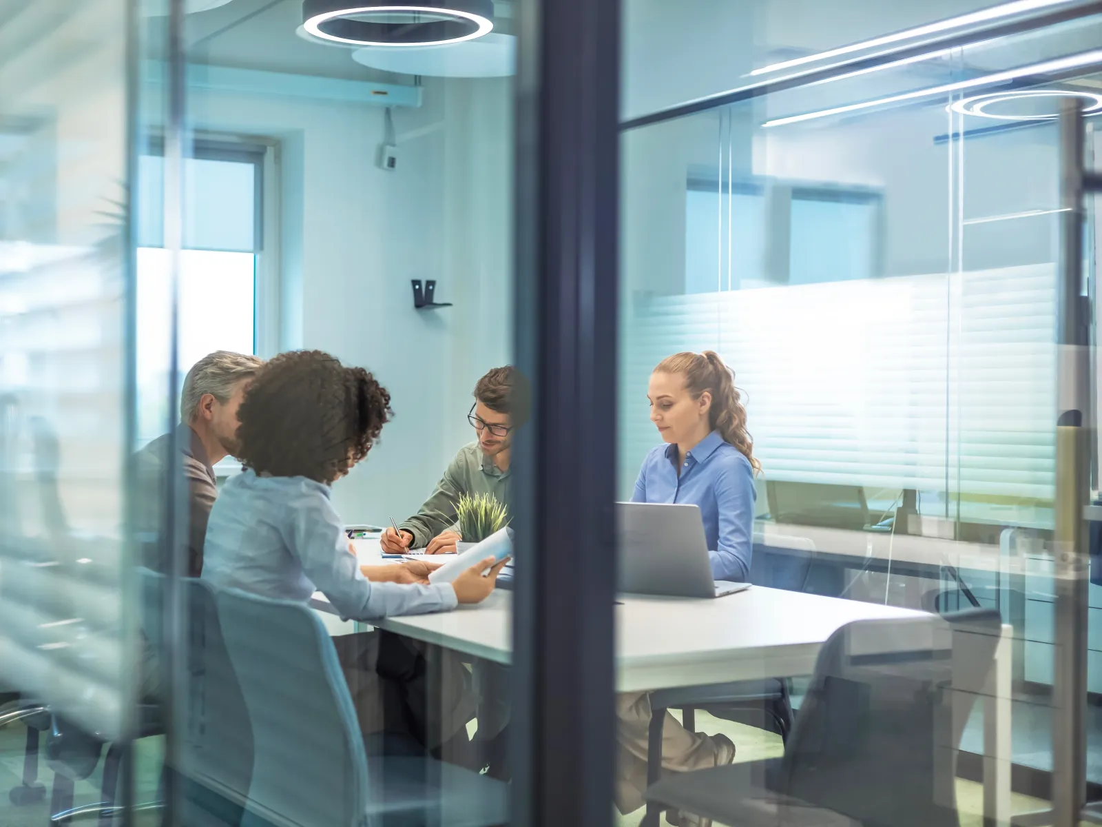 a group of people sitting at a table