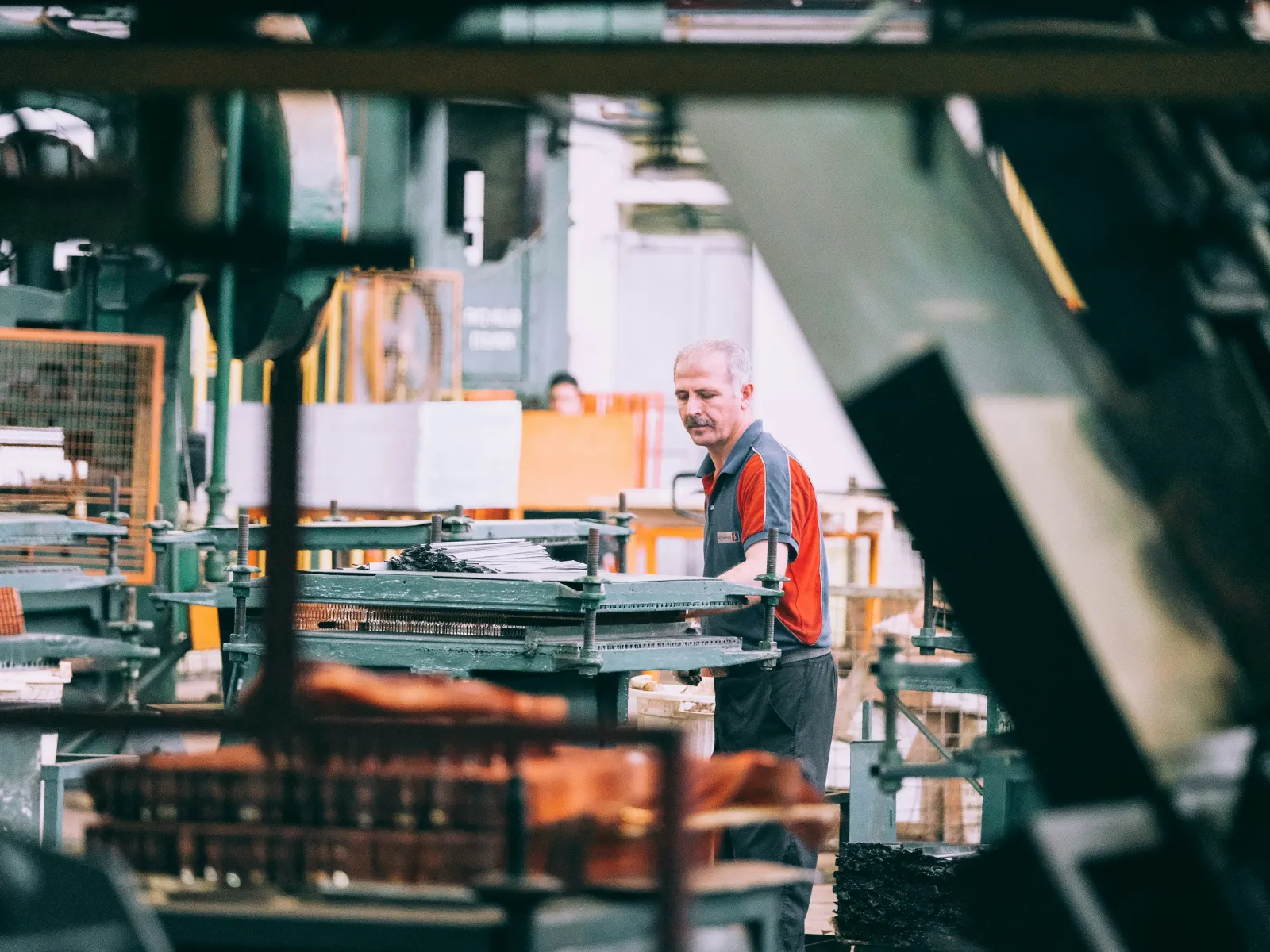 a man standing in a factory