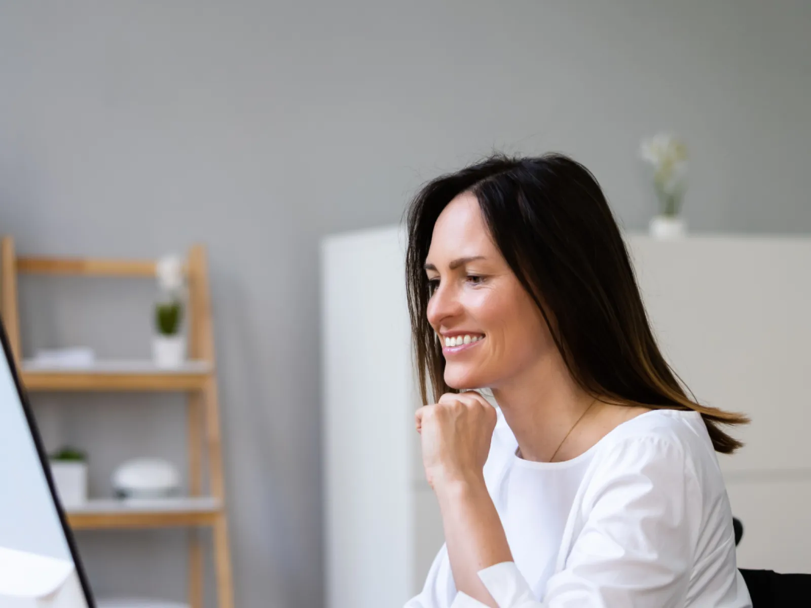 a woman sitting at a desk