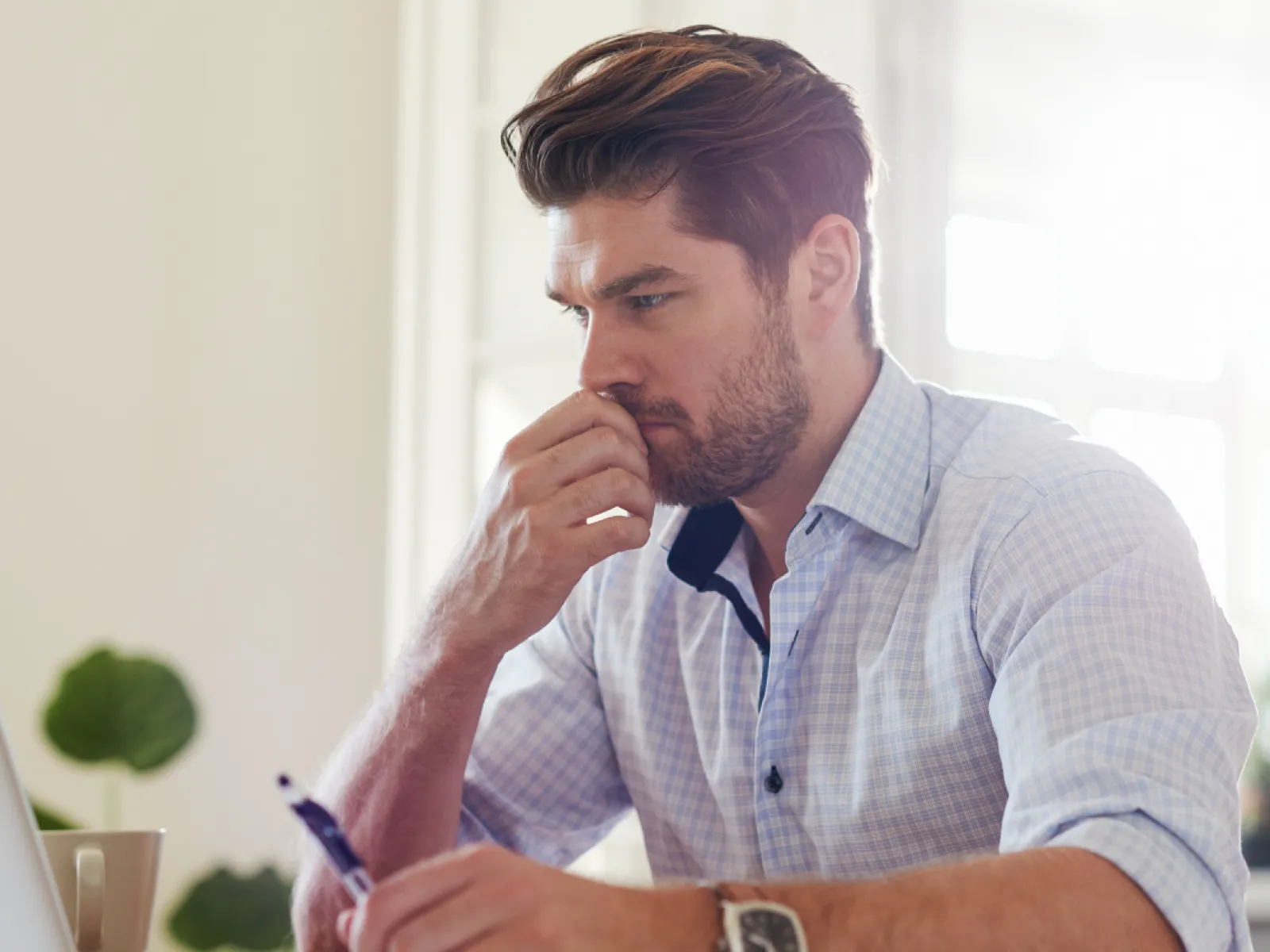 a man sitting at a desk