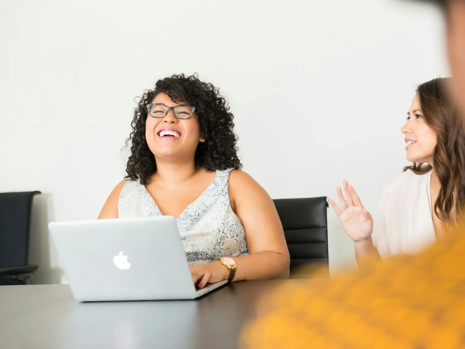 a few people sitting at a table
