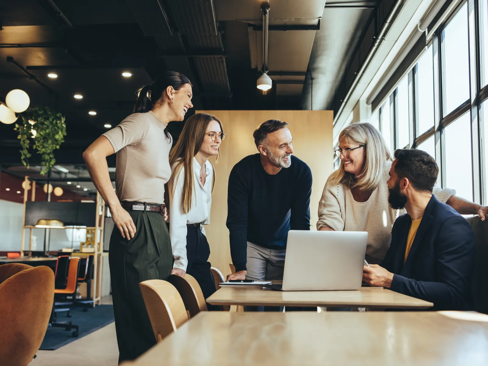 a group of people in a meeting