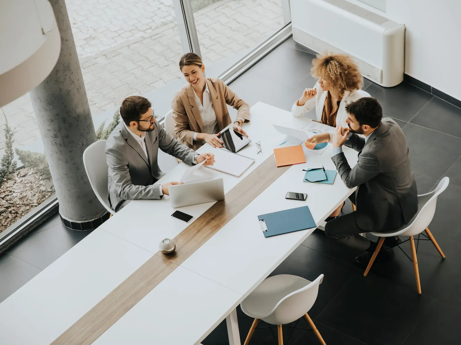 a group of people sitting around a table