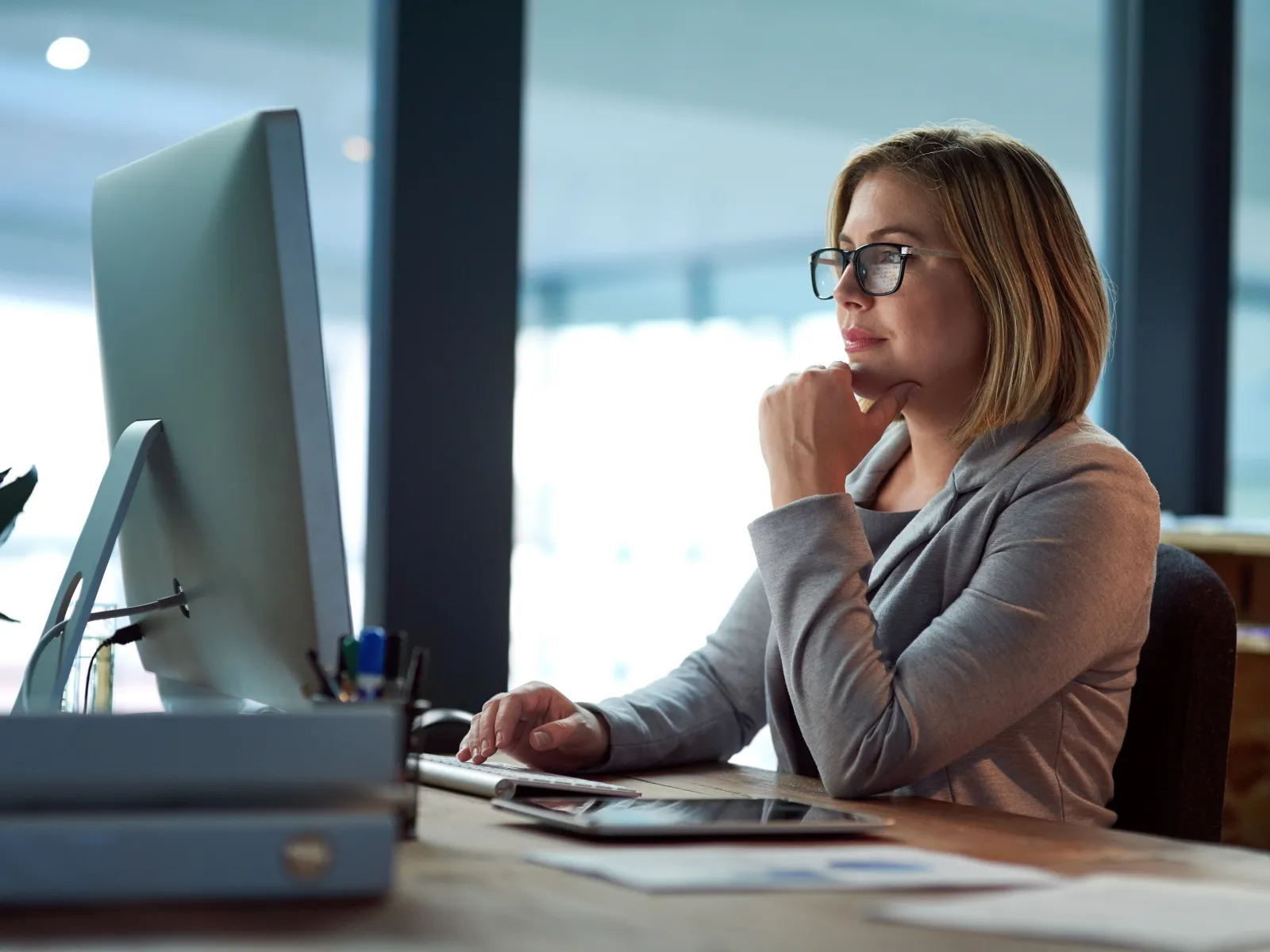 a woman sitting at a desk