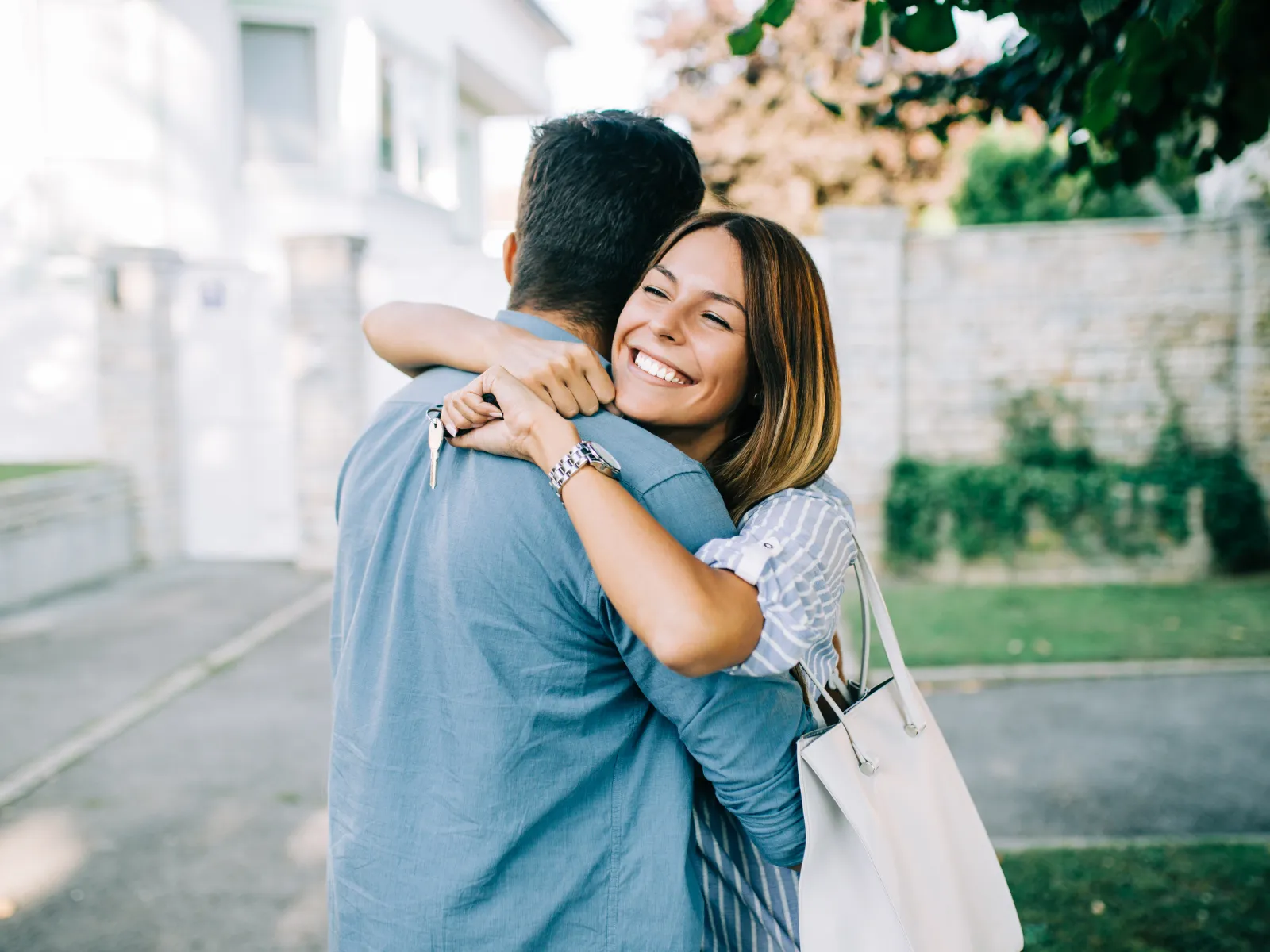 a man and woman hugging after a Charlotte home inspection, LunsPro Inspection Group, charlotee nc home inspector, carolina Residential and Commercial Home Inspections, Carolina home inspector, Carolina drone inspections, Carolina septic and sewer scope inspections, Carolina radon testing, Carolina mold and air quality testing, Carolina pool inspections, Carolina home maintenance
