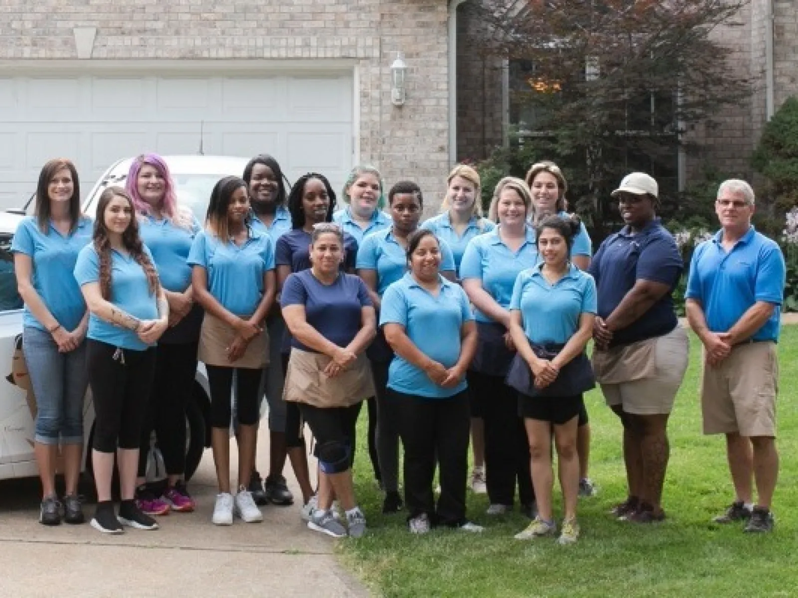 a group of people posing for a photo