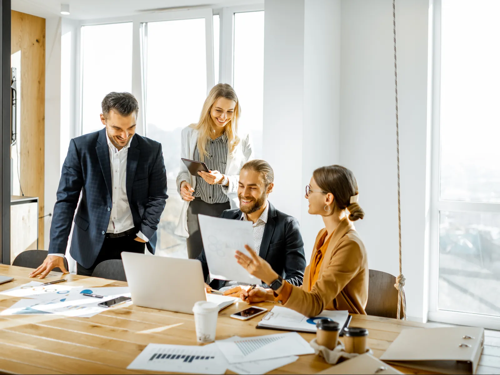 a group of people in a meeting