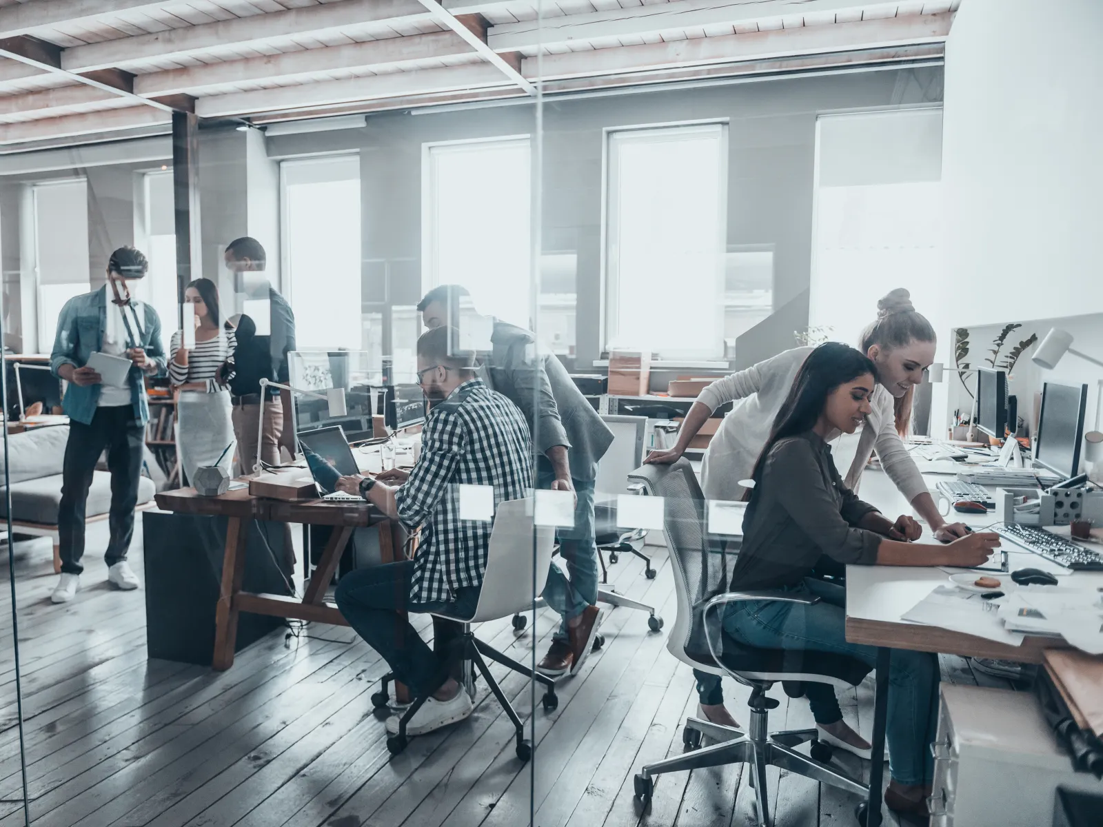 a group of people in an office
