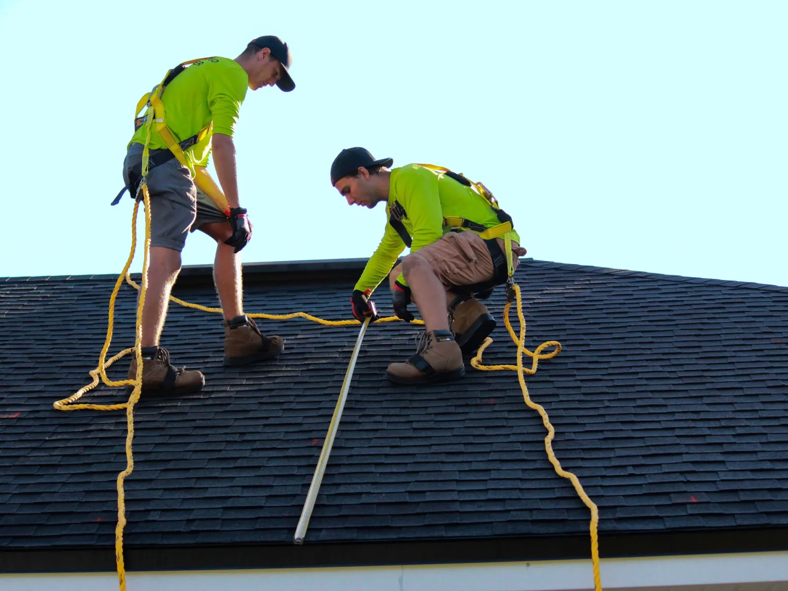 men working on a roof